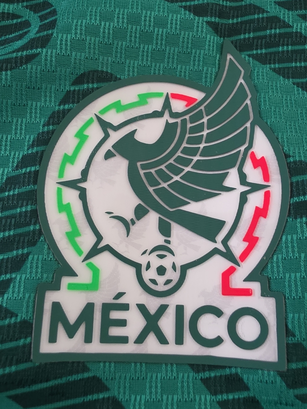 Green Soccer Jersey with Red and White Trim - Picture 4 of 11